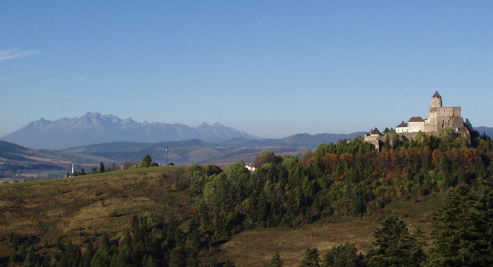 A view to the castle from the east, the Tatras mountains can be seen behind.