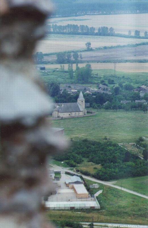 View of the early medieval church in the village from the castle.